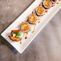 Salmon Skin Roll · salmon skin, gobo, radish sprouts, avocado and cucumber roll with smelt eggs.