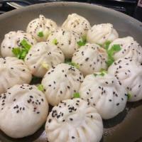 Shanghai pan fried pork soup dumplings(6) · Stuffed dough. 