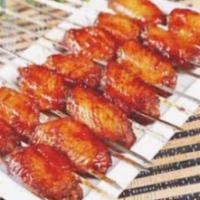 304. Chicken Wing Skewer · Grilled meat that has been cooked on a skewer. 