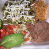 Enchiladas Dinner · 3 enchiladas topped with red or green sauce served with rice, beans and salad