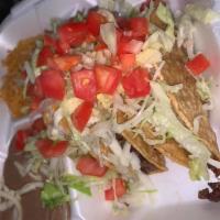 taco crispy dinner · 3 taco crispy meat of your choice served with rice and beans on the side