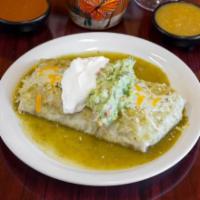 Verde Guacamole Burrito · Pork burrito served with our delicious spanish rice and refried beans covered in our salsa v...