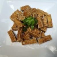Crispy Fried Tofu · Tofu fried to crispy perfection with house special marinated sauce. Served with our house sw...