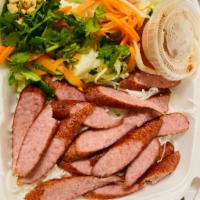 Premium Pork Sausage Salad Noodle  · Premium Grilled Pork Sausage, rice noodle, lettuce, cucumber, carrot, daikon . Served with F...