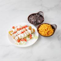 Flautas · Taquitos dorados. 3 rolled hard tacos topped with lettuce, tomato, crema and queso fresco an...