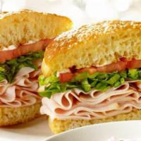 Turkey Ham & Cheese Sandwich · Includes cheese, lettuce, tomato and dressing.