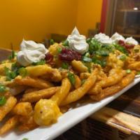 Dorian's Hi-Jacked Fries · Seasoned fries, topped with our bacon cheddar potatoes, sour cream, crispy apple wood bacon ...