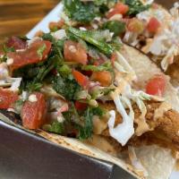 Tam's Tacos · Catfish or shrimp, blackened or fried flour tortilla with coleslaw. Pico de gallo, and our s...