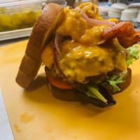 Big Mouth Burger · 1/2 lb. seasoned ground beef, lettuce, pickle, bacon, cheddar cheese, sauteed red onion, and...