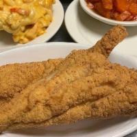 Fryday Night Live · 2 farm raised catfish fillets coated in seasoned cornmeal and deep fried.