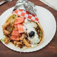 18. Combo Gyro · Lettuce, tomatoes, onions chicken, beef, lamb, tzatziki on a pita bread, optional: hot and g...