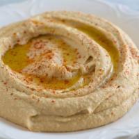 26. Hummus Plate with Pita Bread · Dip made from chickpeas.