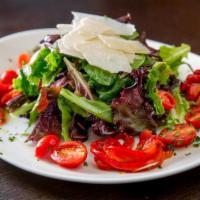Insalata Fresca · Mesculin salad, cherry tomatoes, roasted red peppers and shaved Parmigiano Reggiano cheese w...