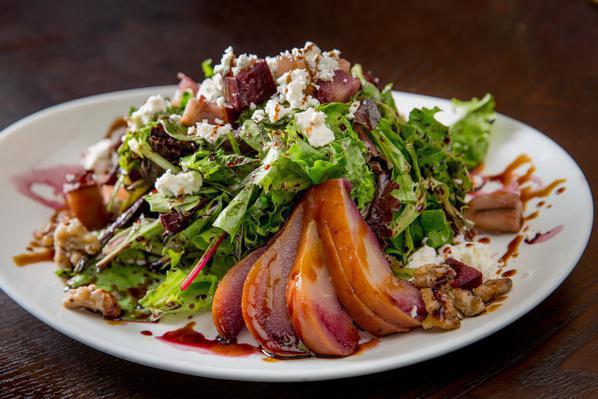 Pere Gorgonzola Salad · Mixed greens, Gorgonzola, and fresh pears in red wine dressing.