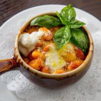 Gnocchi al Forno · Baked gnocchi, tomato sauce and mozzarella.