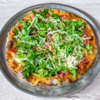 Rustica Pizza · Mozzarella, arugula, prosciutto di parma, shaved Parmigiano and truffle oil.
