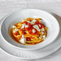 Spaghetti Alla Chitarra con Filetto di Pomodoro · Chitarra spaghetti with cherry tomatoes and diced fresh mozzarella.