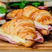 Breakfast Ham and Cheese Croissant · French ham and melted Swiss cheese on a croissant.