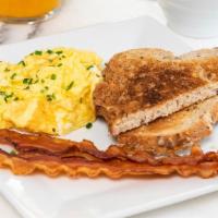 Breakfast Scrambled Eggs · 2 scrambled eggs served with bacon and roasted potatoes or toast.