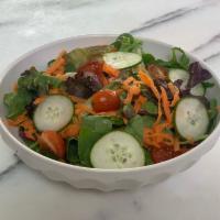 Le Bon Mixed Greens Salad · Served with cherry tomatoes, grated carrots and cucumber, and herb vinaigrette. Vegetarian (...