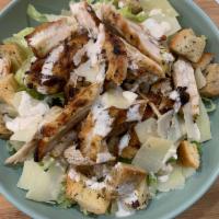 Grilled Chicken Caesar · Grilled chicken breast, shaved parmesan, garlic croutons and chopped romaine, classic caesar...