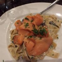 Smoked Salmon Pappardelle Pasta · Pappardelle pasta, smoked salmon, mascarpone cream sauce, and chives.