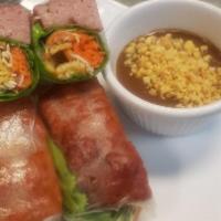16. Traditional Rolls · Rice paper wrapped with shrimp, pork, lettuce, cabbage, cucumber, carrots and vermicelli. Se...