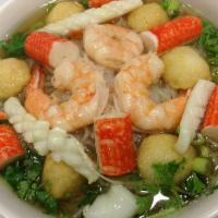 32. Seafood Noodle · Special beef or chicken soup cooked from bone with rice noodle, cilantro, onion and your cho...