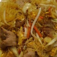 79. Beef Singapore Noodle · Thin rice noodle stir fried with eggs, bean sprouts, onion, celery, carrot, cabbage, bell pe...