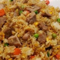 83. Pork Fried Rice Dish · Fried rice with egg, onions, carrots, peas and your choice of meat. 