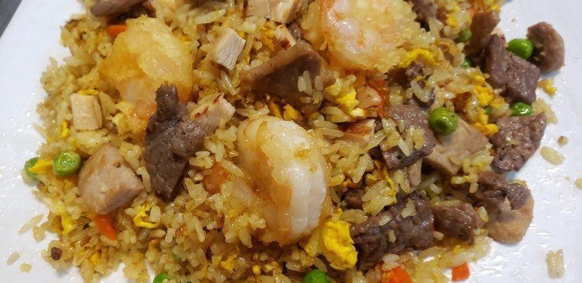 88. Combination Fried Rice · Fried rice with egg, onions, carrots, peas and your choice of meat. Shrimp, Beef, Chicken, Pork