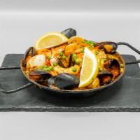 Seafood Paella  for 1 · Paella marinara. Scallops, calamari, shrimp, mussels, fish, valencia rice cook in a fish and...