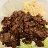 06 - BBQ Beef · Served with white rice and macaroni salad.