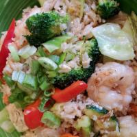 Thai Fried Rice · Choice of protein with assorted fresh vegetables, pineapple, and egg fried rice in a soy gin...
