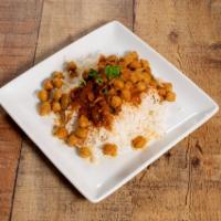 Chana Masala · Garbanzo beans cooked with onions, tomatoes and Indian spices. 