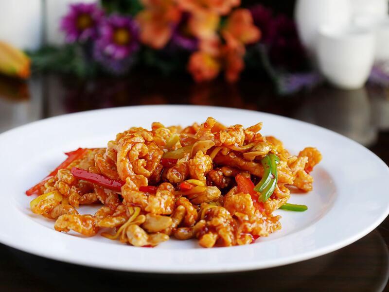 Thai Cashew Chicken · Crispy chicken mixed with shredded mango and bell pepper in a sweet thai chili sauce, tossed with cashew nuts.
