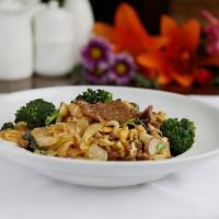 Drunken Noodle · Fresh made broad rice noodles, egg, red onion, scallion, broccoli & basil stir-fried with a ...