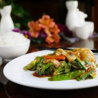 Chicken with Garlic Sauce · Chicken breast with mixed vegetables in a sweet, sour, spicy & garlicky brown sauce.