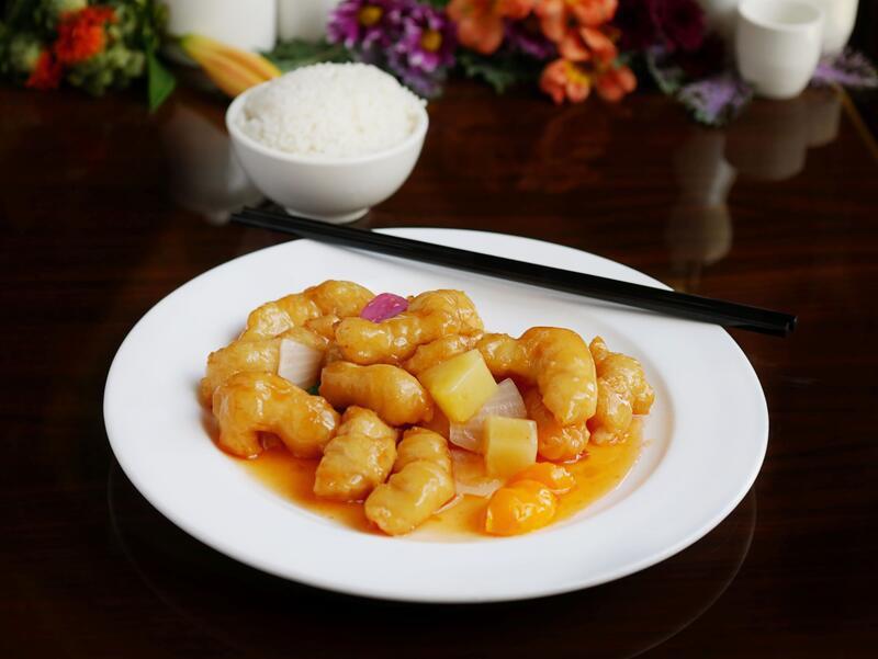Sweet & Sour Chicken · Breaded chicken nuggets, pineapple, bell pepper and onion tossed in a sweet and sour sauce.