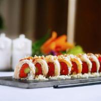 Super Crunchy Roll · Inside: spicy tuna and asparagus. Outside: tuna, yellowtail, salmon, white tuna and tempura ...