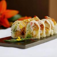 10 Piece Lion Roll ·  Soft shell crab, shrimp tempura, avocado, cucumber and crab salad wrapped in sesame soy pap...