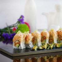 New Orleans Roll · Inside: spicy crawfish and avocado outside: lobster salad, spicy crab and tobiko served with...