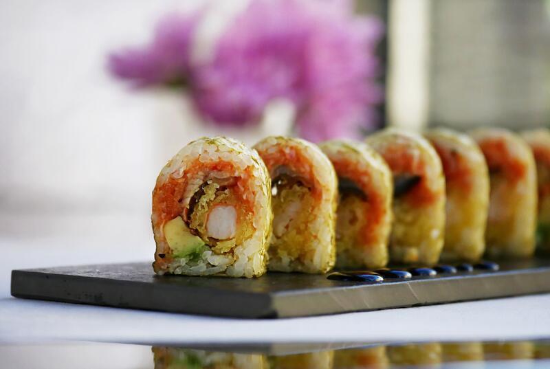 Viper Roll  · Eel, avocado, tempura shrimp and spicy tuna wrapped with marble seaweed, topped with eel sauce.