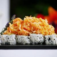 Volcano Roll · California roll topped with baked crabmeat and scallop, served with spicy mayo.