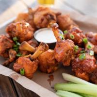 Chicken Wings · 6 pieces. Extra ranch or bleu cheese for an additional charge. Served with choice of one fla...