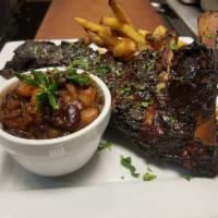 Baby Back Beef Ribs · 613 Baked Beans, Slaw, Brushed with BBQ Sauce