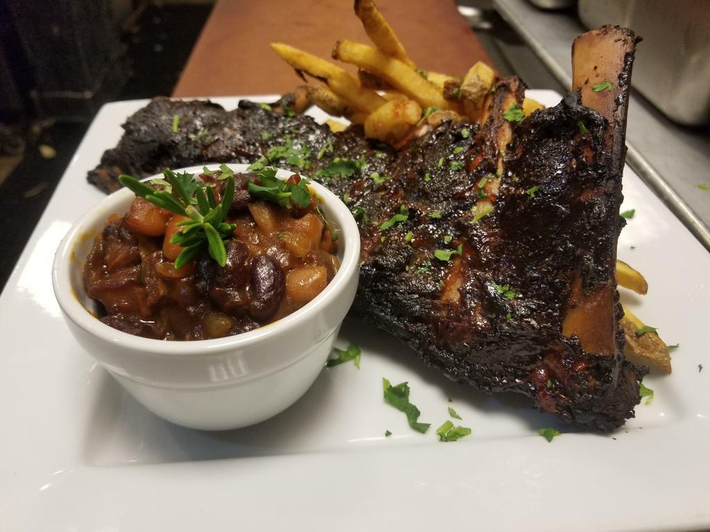 Baby Back Beef Ribs · 613 Baked Beans, Slaw, Brushed with BBQ Sauce