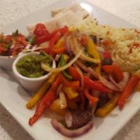 Fajitas · Sautéed Onion & Pepper, Flour Tortillas, Pico de Gallo, Guacamole, & Rice