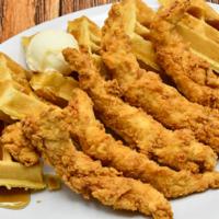 Chicken & Waffles · Homemade Belgian waffles, crisp fried chicken tenders & syrup. Served with whipped butter an...