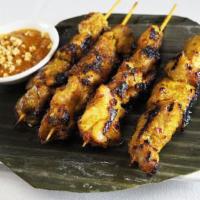 Satay Chicken · Grilled and marinated with spiced and served with peanut sauce.